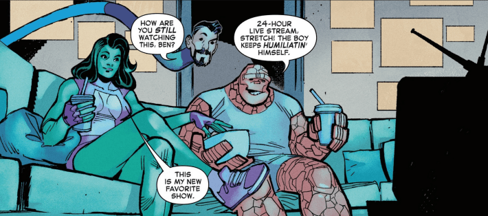 The stretchy man, Mr. Fantastic, looks over the shoulders of She-Hulk and the rocky man, The Thing, as they watch TV.